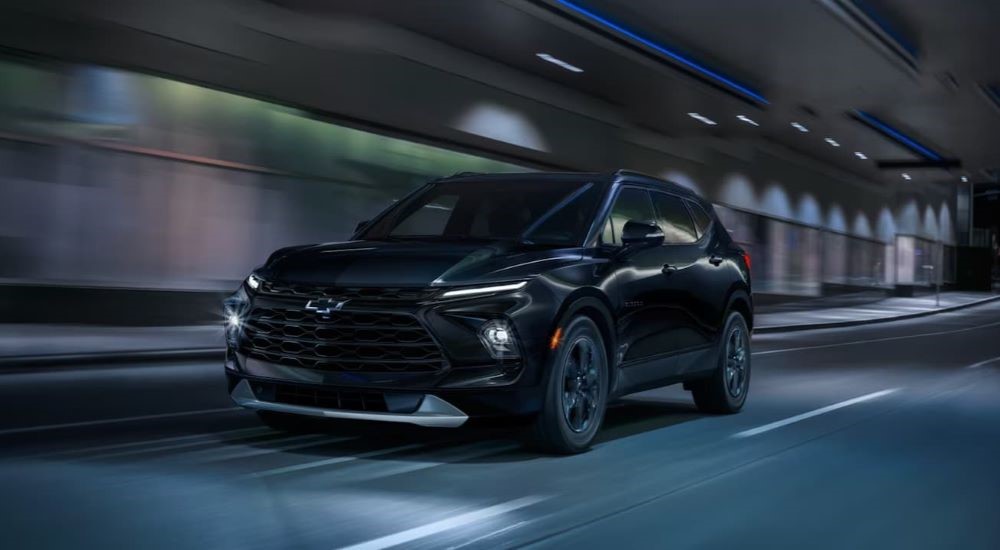 Black 2024 Chevy Blazer driving through a tunnel