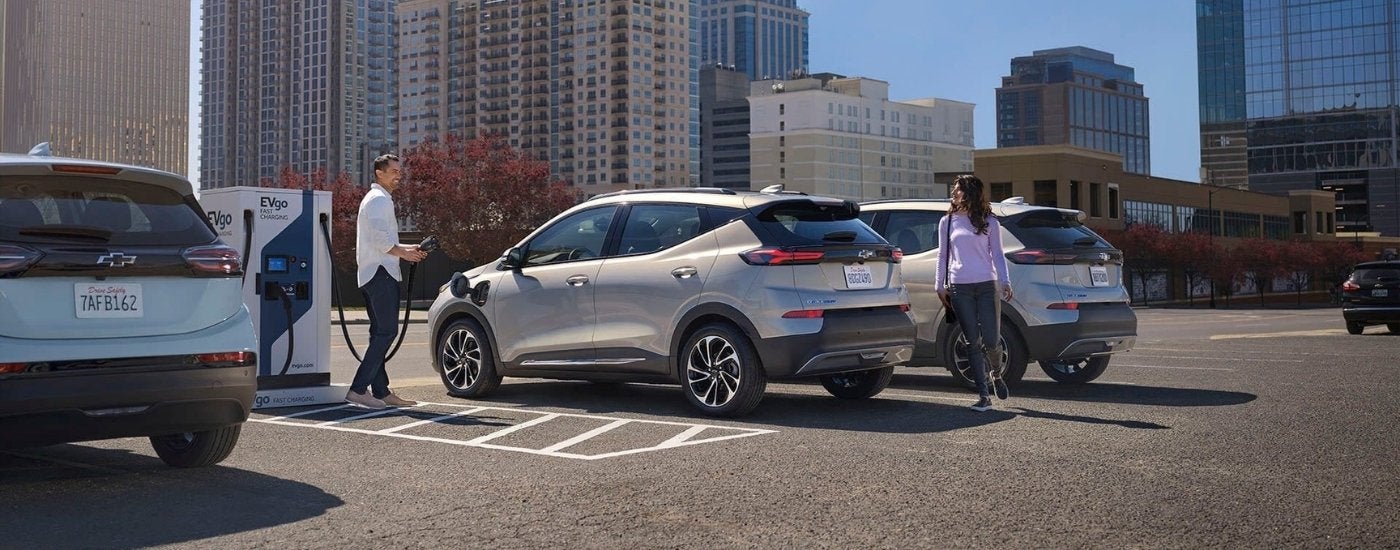 Grey 2022 Chevy Bolt EUV parked at a charging station